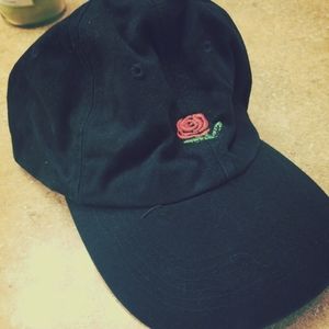 Black hat with embroidered red rose